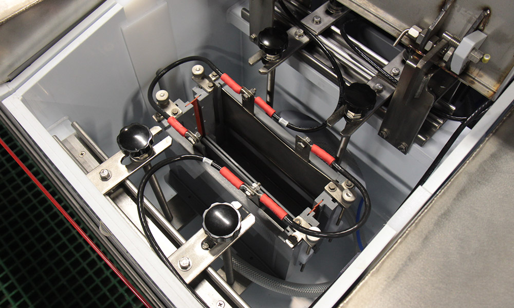 System cells with integrated air knives and brushes.
