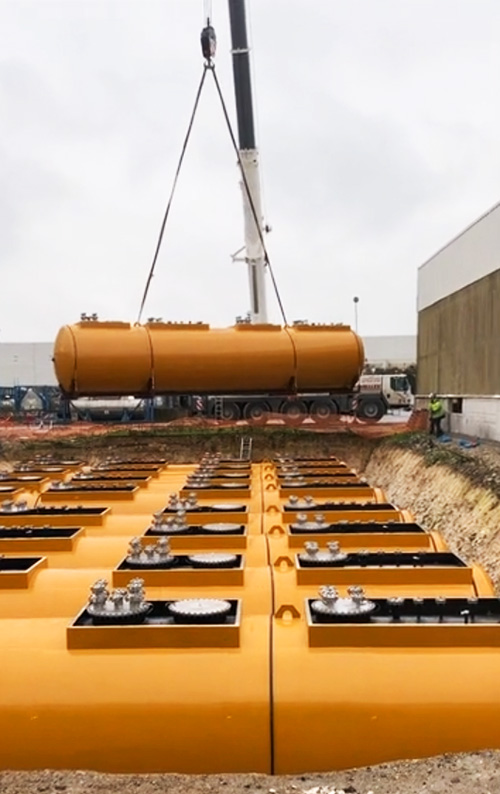 Tank being hoisted by crane