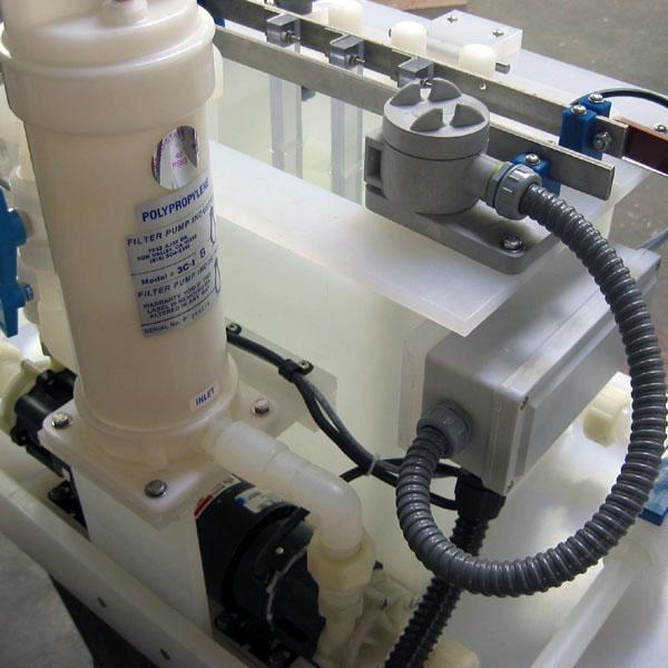 Filter pump and agitation arm