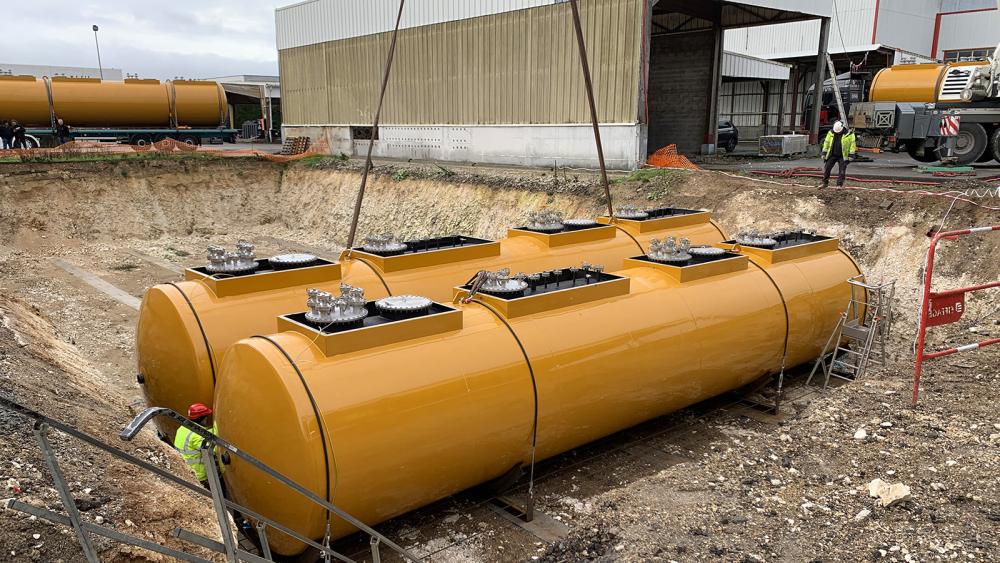 Tanks are positioned into a prepared bed