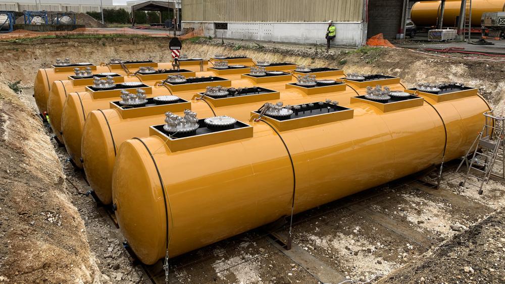 Tanks are positioned into a prepared bed