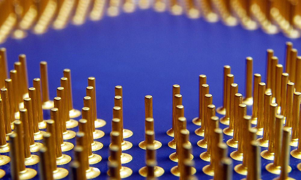 Gold pins on a microprocessor component